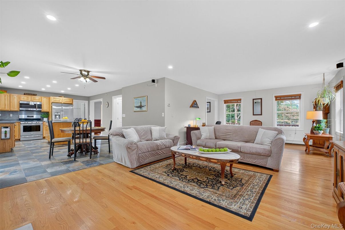 Dining room, Interior, Kitchen, Living room, Recessed Lighting, Stainless Steel Appliances, Wood Texture Flooring