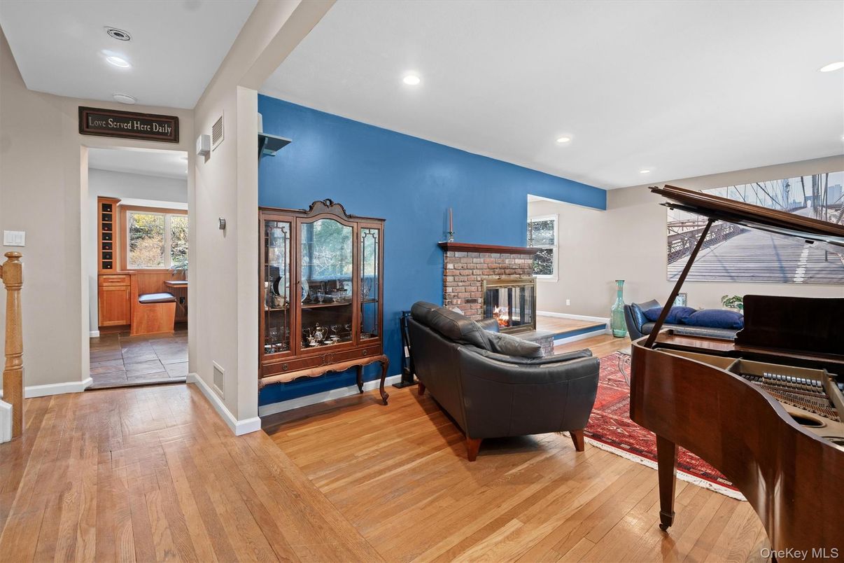 Fireplace, Interior, Piano, Recessed Lighting, Wood Texture Flooring