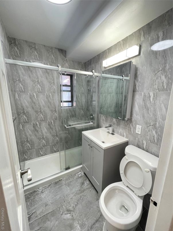 Bathroom, Dual Sink Vanities, Glass Shower, Interior, Marble Walls