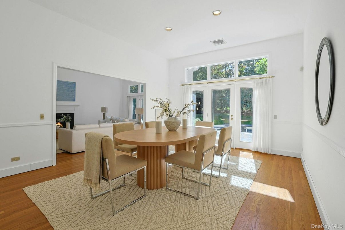 Dining room, Fireplace, Interior, Living room, Recessed Lighting, Wood Texture Flooring