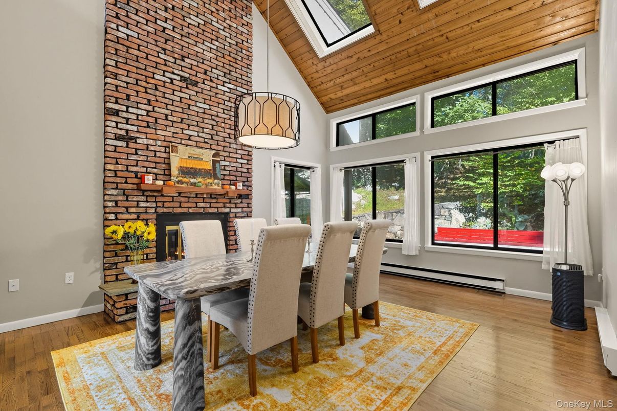 Dining room, Fireplace, Interior, Pendant Lights, Stone Walls, Wooden Ceilings, Wood Texture Flooring