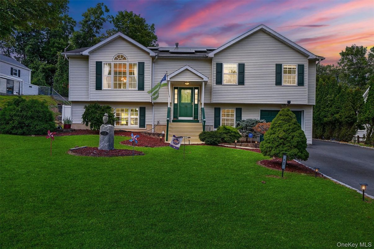 Attached, Exterior, Facade, Solar Panels, Raised Ranch