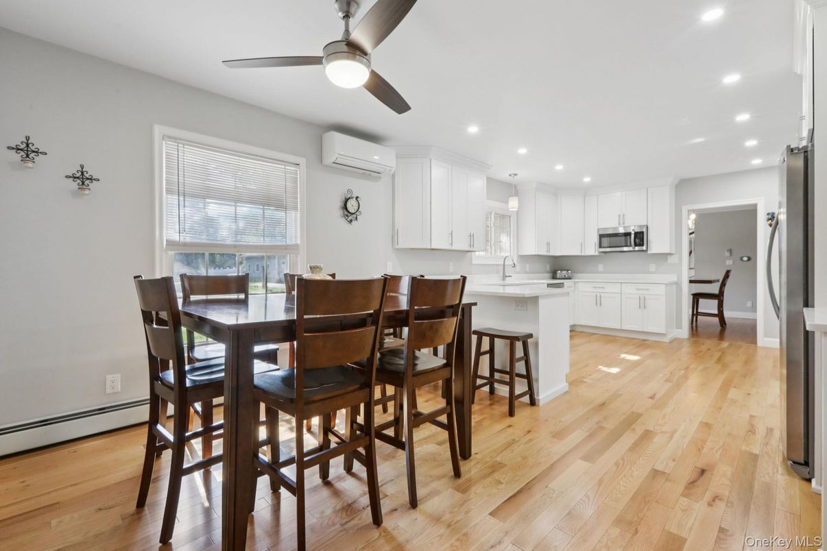 Dining room, Interior, Kitchen, Recessed Lighting, Stainless Steel Appliances, Wood Texture Flooring