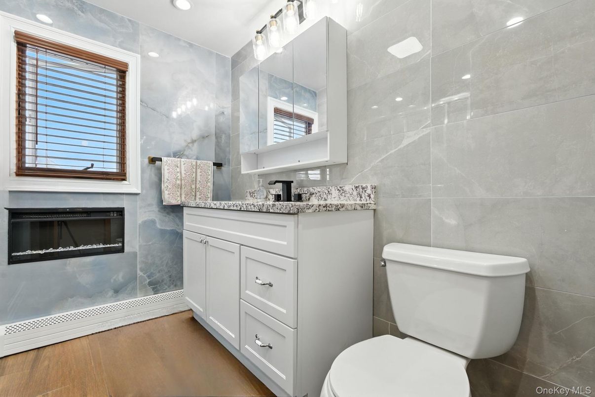 Bathroom, Fireplace, Interior, Recessed Lighting, Wood Texture Flooring