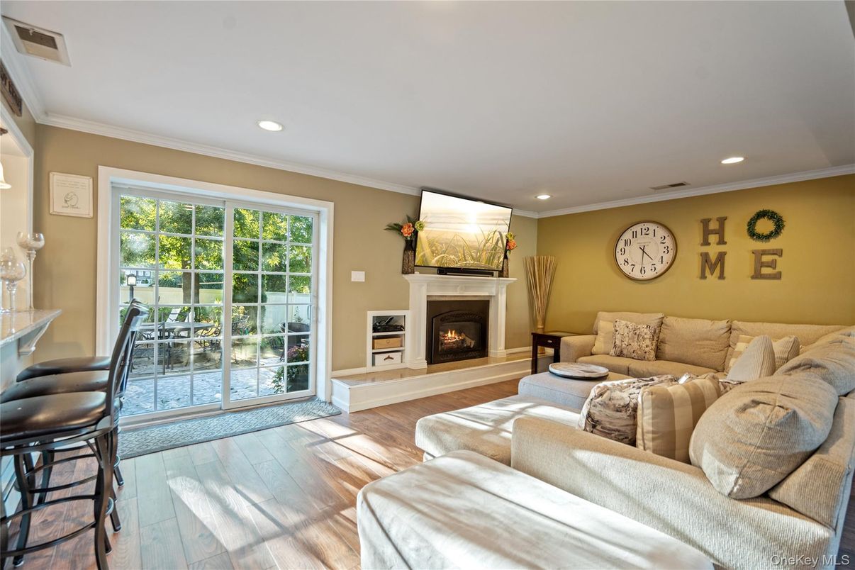 Fireplace, Interior, Living room, Recessed Lighting, Wood Texture Flooring