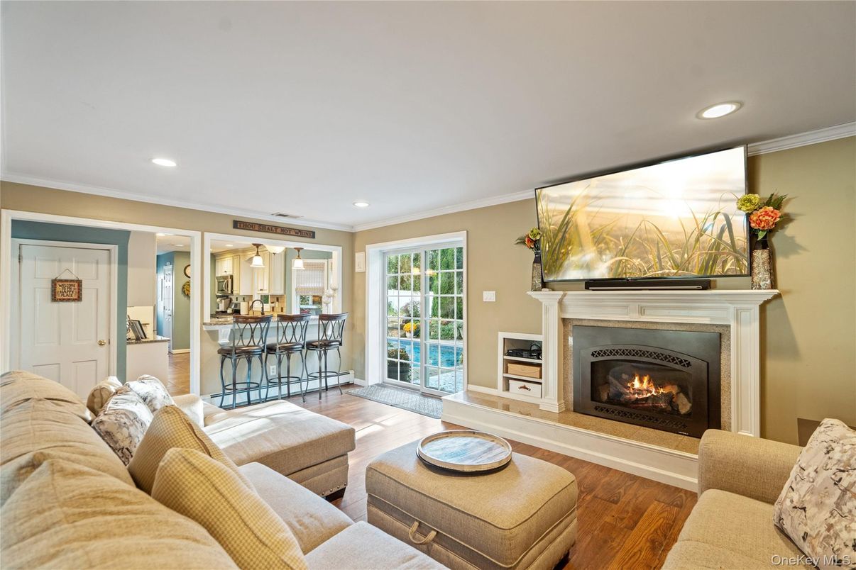 Fireplace, Interior, Living room, Recessed Lighting, Wood Texture Flooring