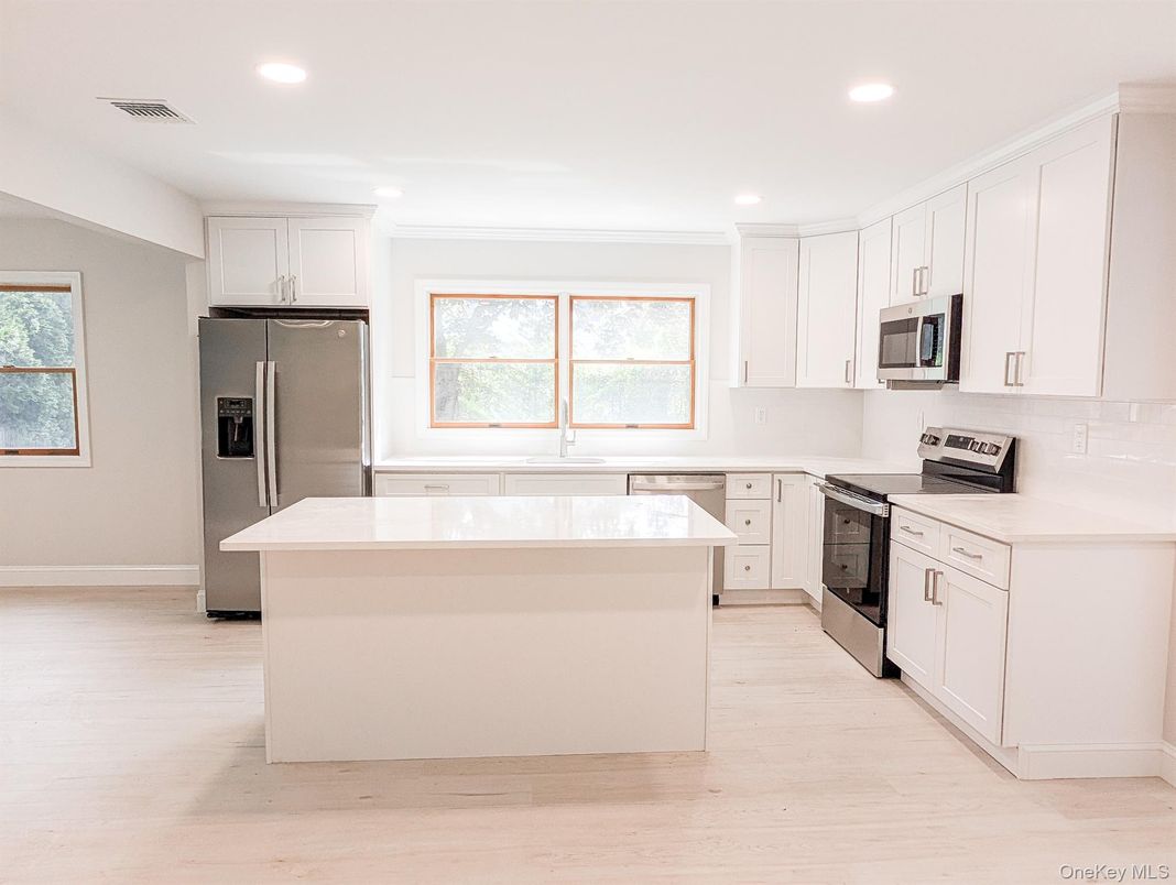 Interior, Kitchen, Recessed Lighting, Stainless Steel Appliances, Wood Texture Flooring