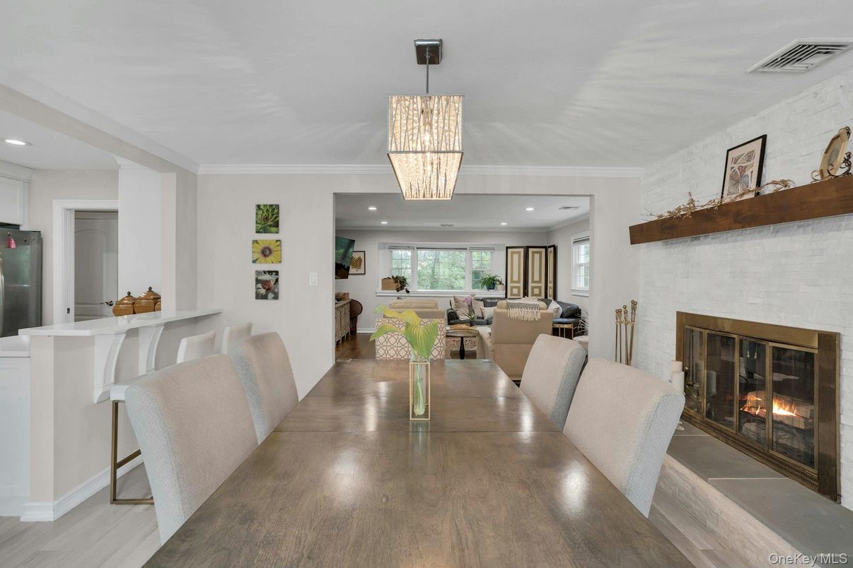 Chandelier, Dining room, Fireplace, Interior, Recessed Lighting, Wood Texture Flooring
