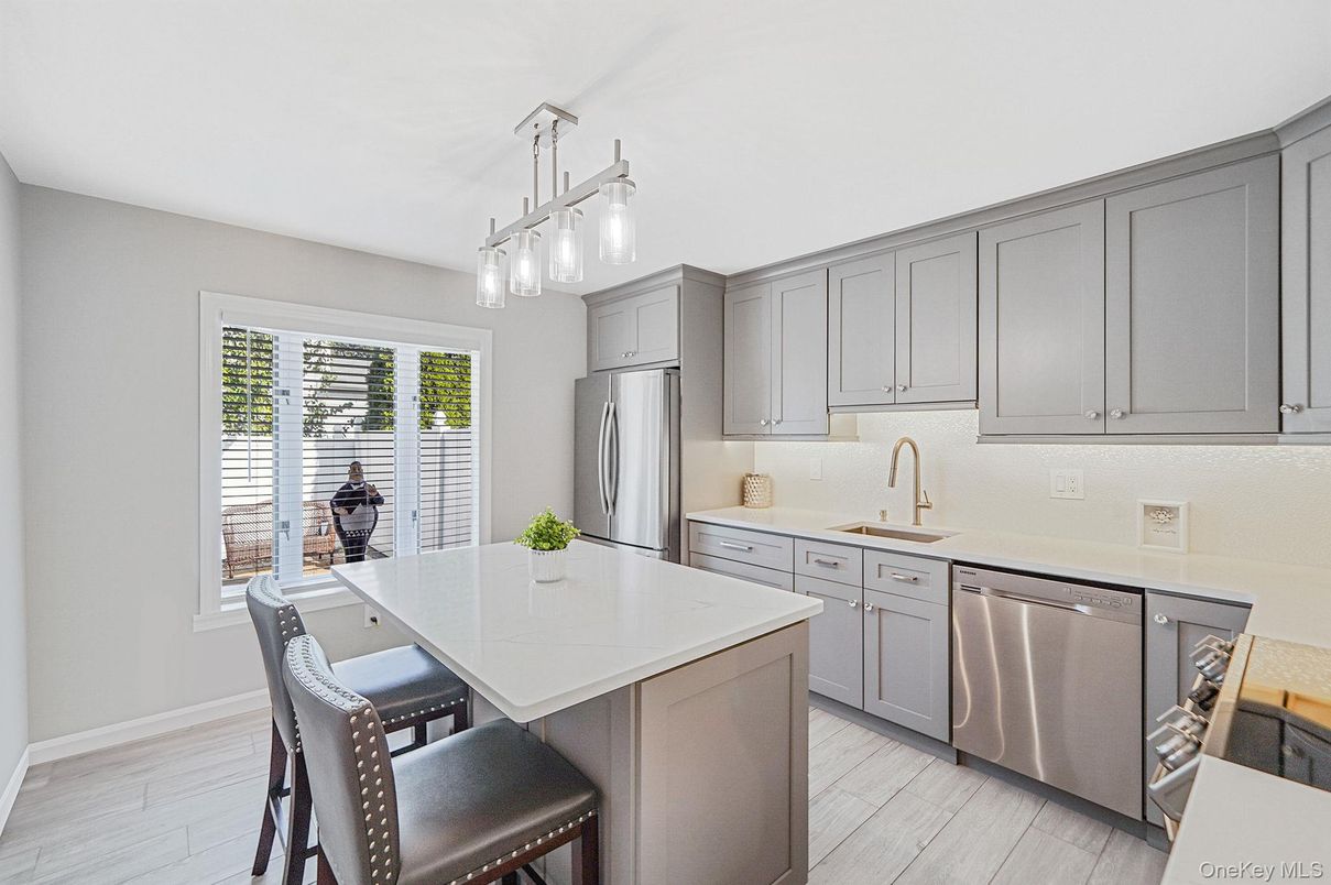 Dining room, Interior, Kitchen, Pendant Lights, Stainless Steel Appliances, Wood Texture Flooring