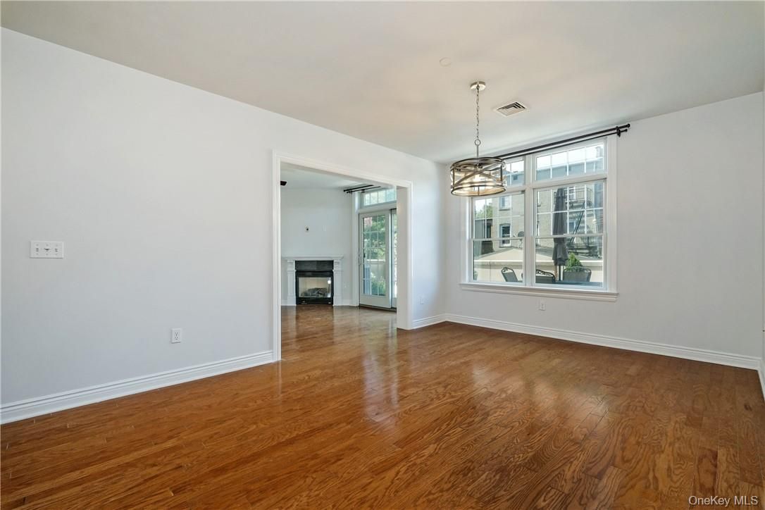 Empty room, Fireplace, Interior, Pendant Lights, Wood Texture Flooring