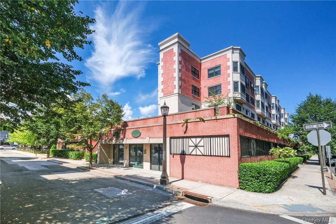 Exterior, Facade, Brick Facade, Condo Building