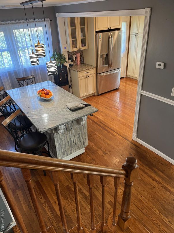 Dining room, Interior, Kitchen, Pendant Lights, Stainless Steel Appliances, Wood Texture Flooring