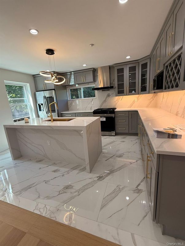 Interior, Kitchen, Marble, Marble Walls, Pendant Lights, Recessed Lighting, Stainless Steel Appliances