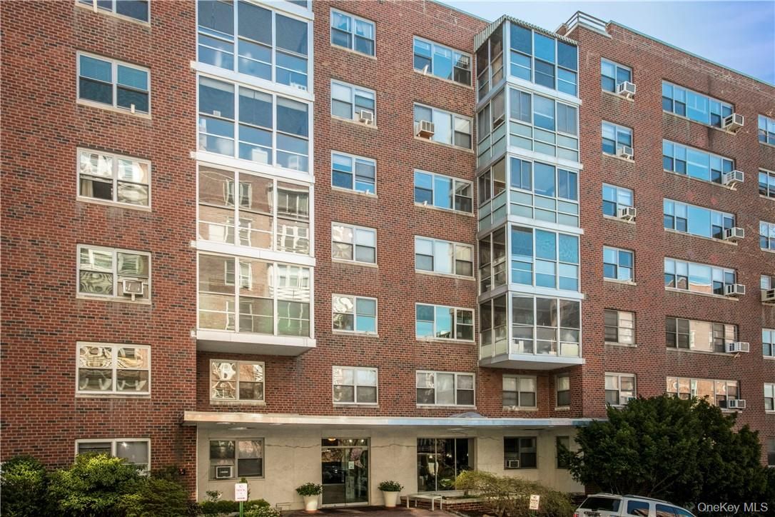 Exterior, Facade, Brick Facade, Condo Building