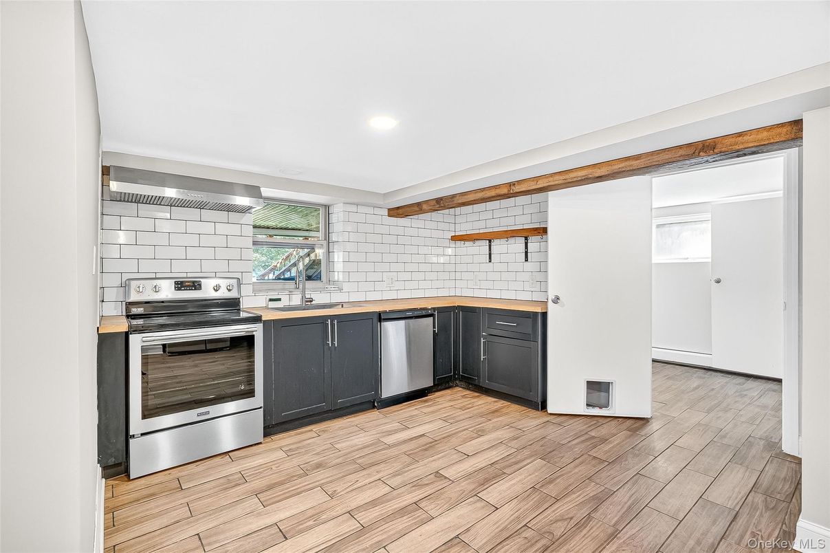 Interior, Kitchen, Recessed Lighting, Stainless Steel Appliances, Wood Texture Flooring