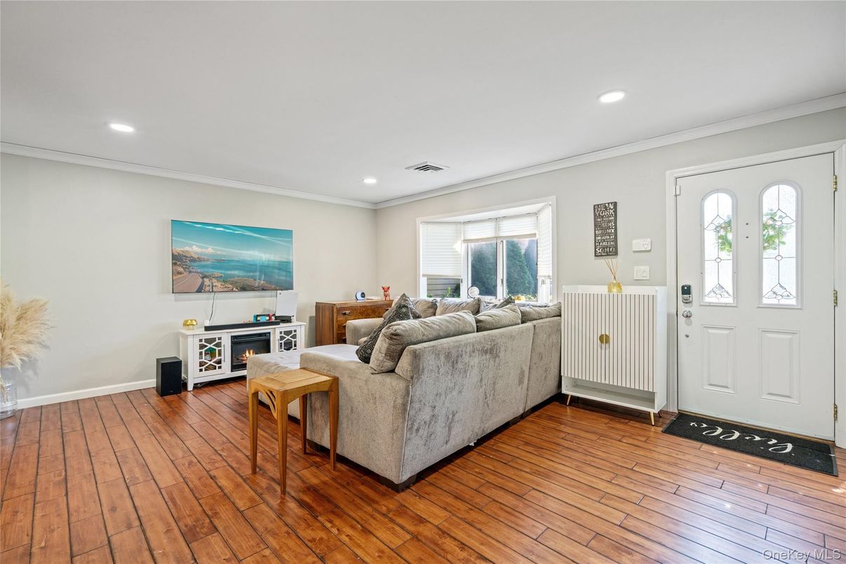 Fireplace, Interior, Living room, Recessed Lighting, Wood Texture Flooring