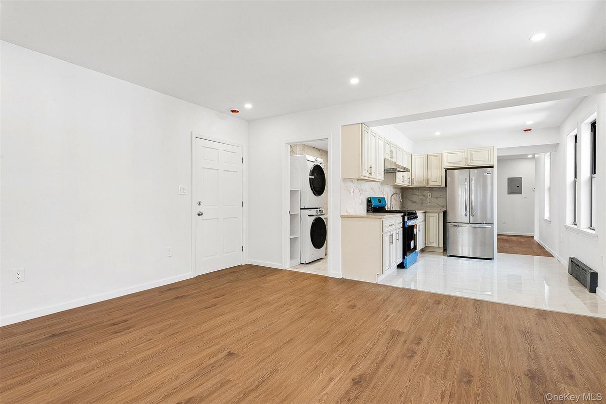 Interior, Kitchen, Recessed Lighting, Stainless Steel Appliances, Washer, Wood Texture Flooring