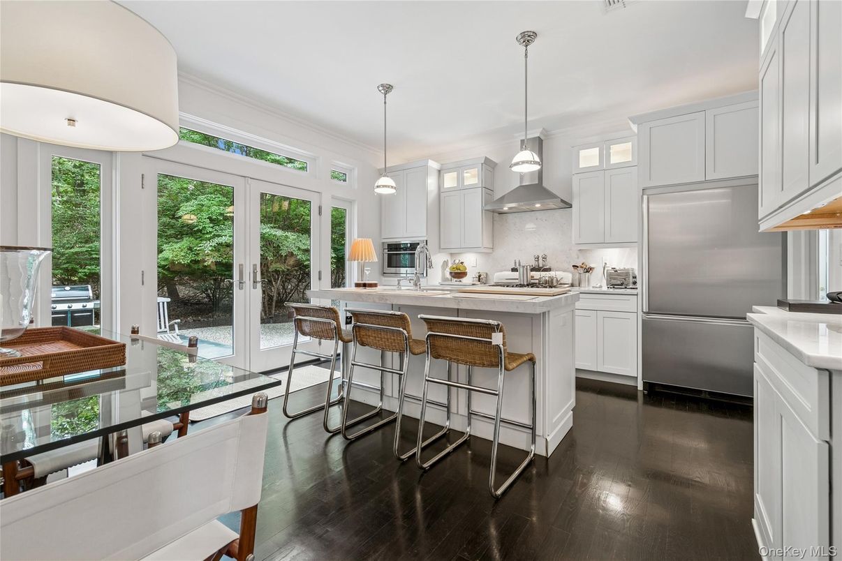 Dining room, Interior, Kitchen, Pendant Lights, Stainless Steel Appliances, Wood Texture Flooring