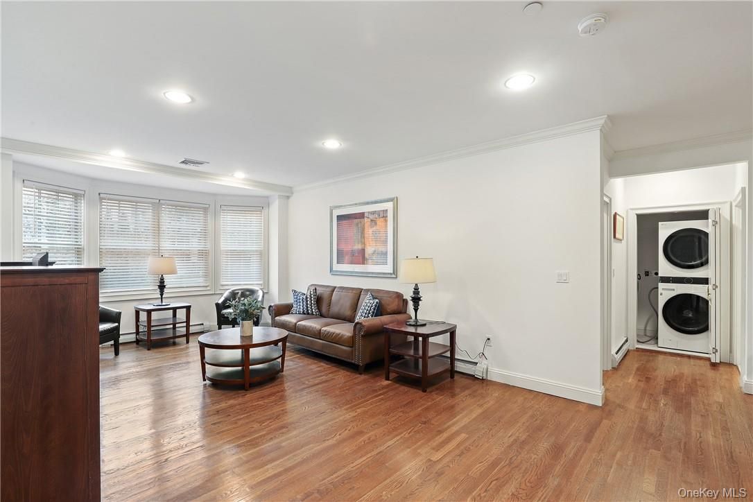 Interior, Living room, Recessed Lighting, Utility Closets, Washer, Wood Texture Flooring