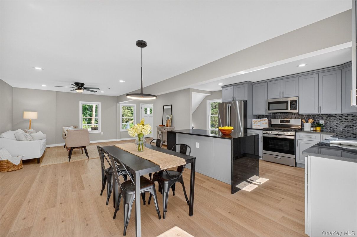 Dining room, Interior, Kitchen, Living room, Pendant Lights, Recessed Lighting, Stainless Steel Appliances, Wood Texture Flooring