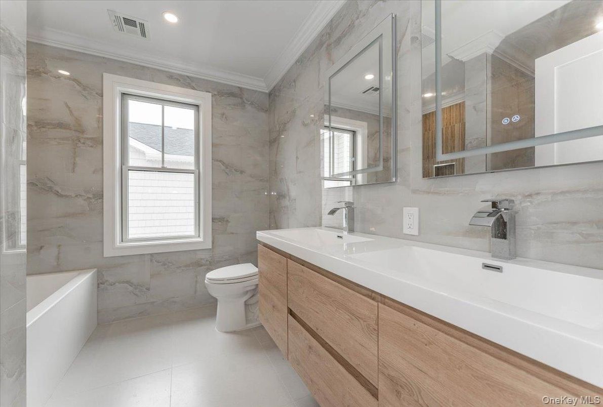 Bathroom, Dual Sink Vanities, Interior, Marble Walls, Recessed Lighting