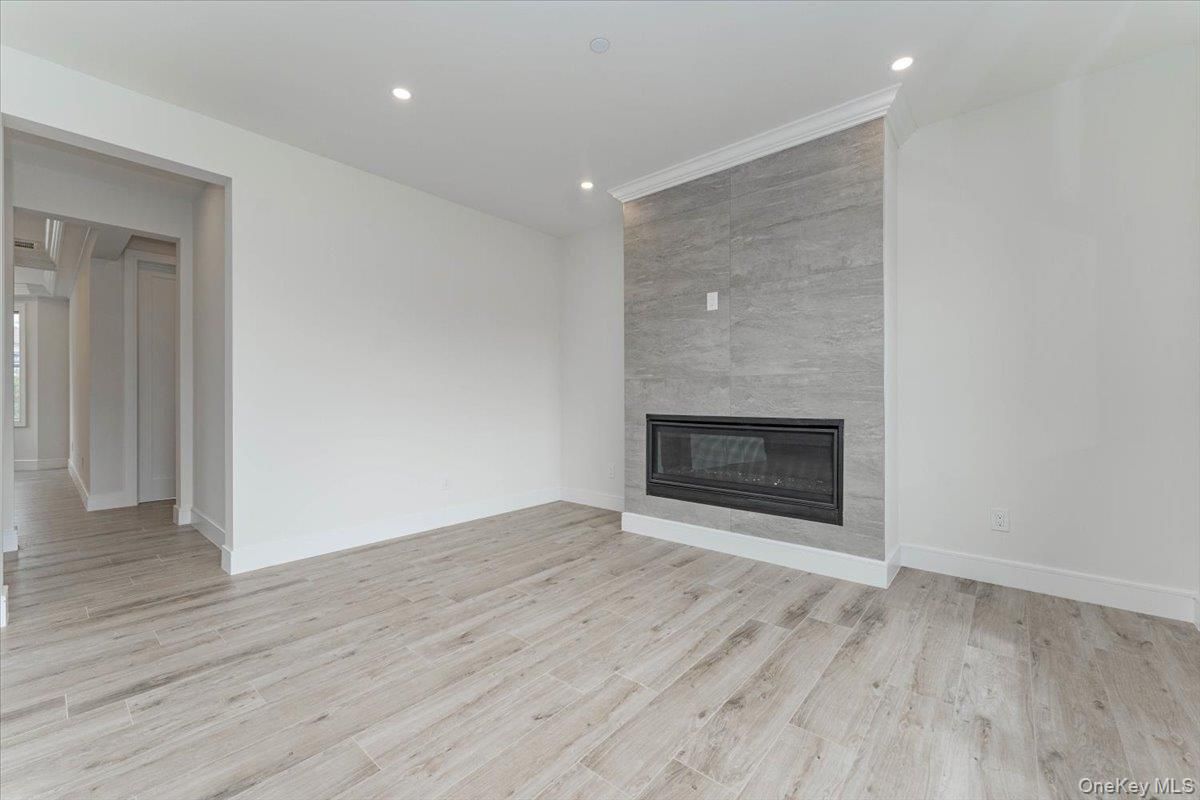 Empty room, Fireplace, Interior, Recessed Lighting, Wood Texture Flooring