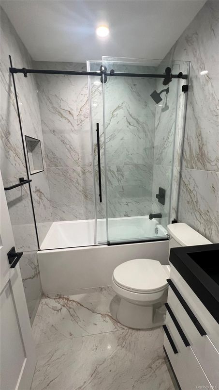 Bathroom, Free Standing Baths, Glass Shower, Interior, Marble, Marble Walls, Recessed Lighting