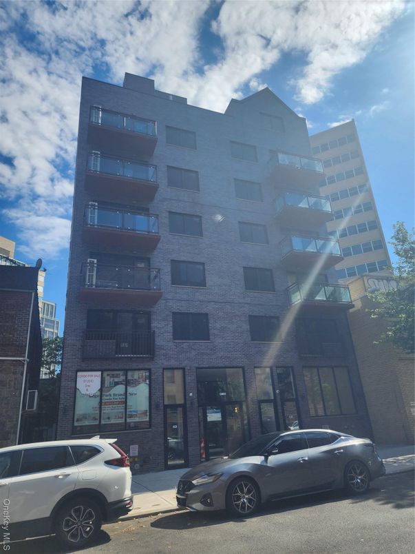 Exterior, Facade, Brick Facade, Condo Building