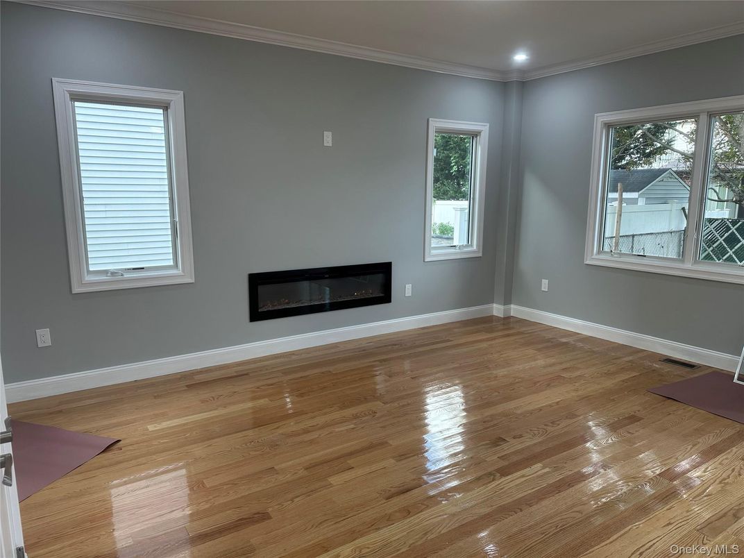 Empty room, Fireplace, Interior, Recessed Lighting, Wood Texture Flooring