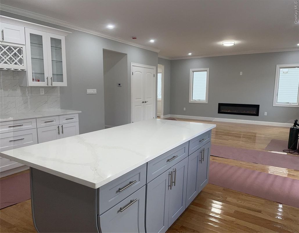 Fireplace, Interior, Kitchen, Recessed Lighting, Wood Texture Flooring