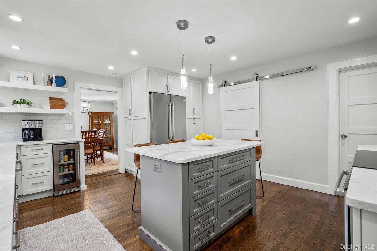 Dining room, Interior, Kitchen, Pendant Lights, Recessed Lighting, Stainless Steel Appliances, Wood Texture Flooring