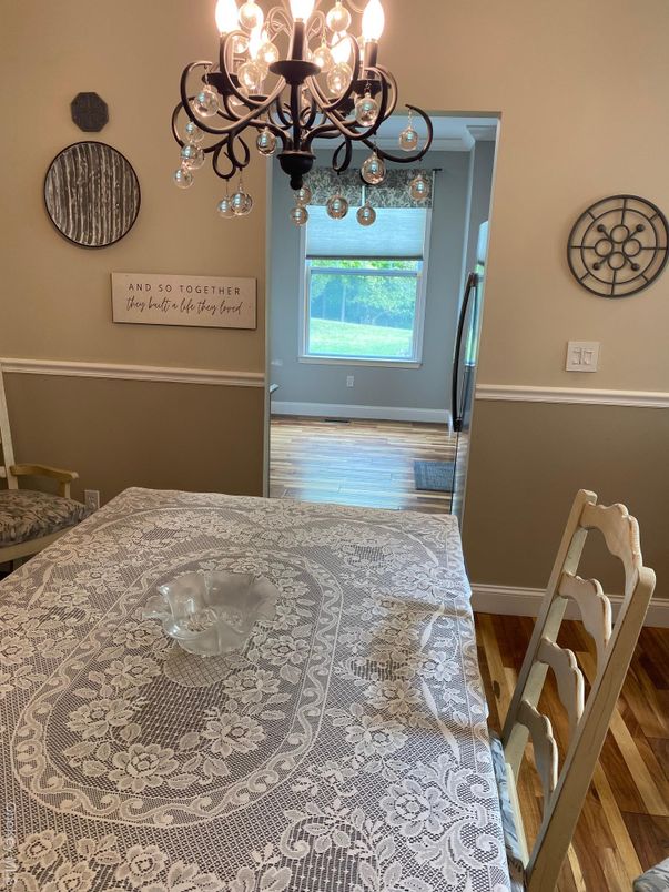 Chandelier, Dining room, Interior, Wood Texture Flooring