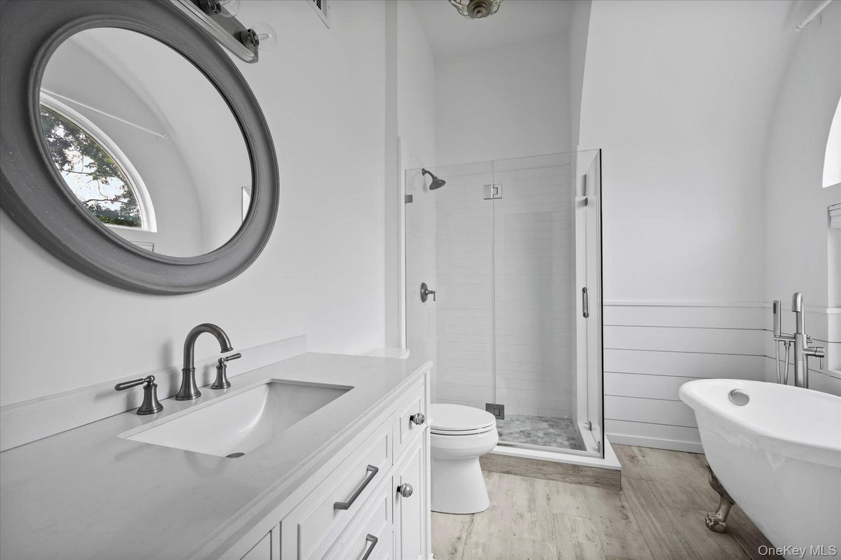 Bathroom, Dual Sink Vanities, Glass Shower, Interior, Wood Texture Flooring