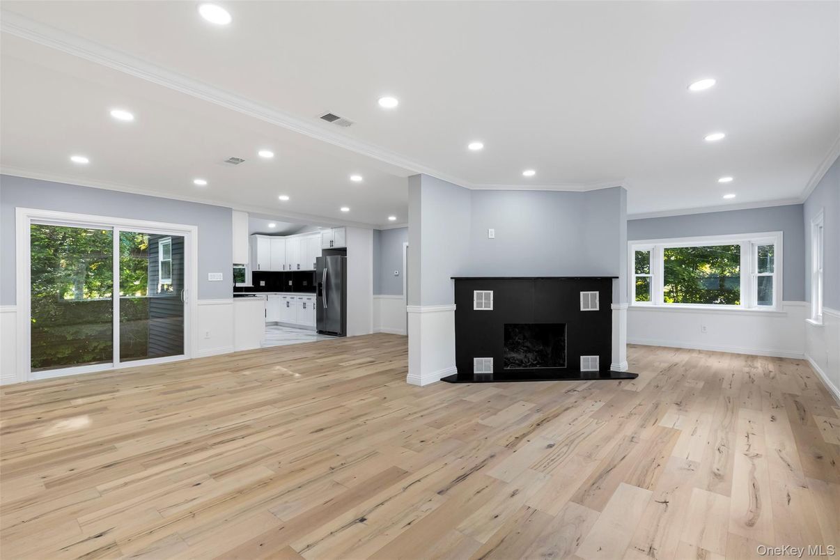 Empty room, Fireplace, Interior, Kitchen, Recessed Lighting, Wood Texture Flooring
