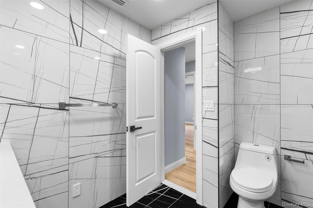 Bathroom, Interior, Marble Walls, Recessed Lighting, Wood Texture Flooring