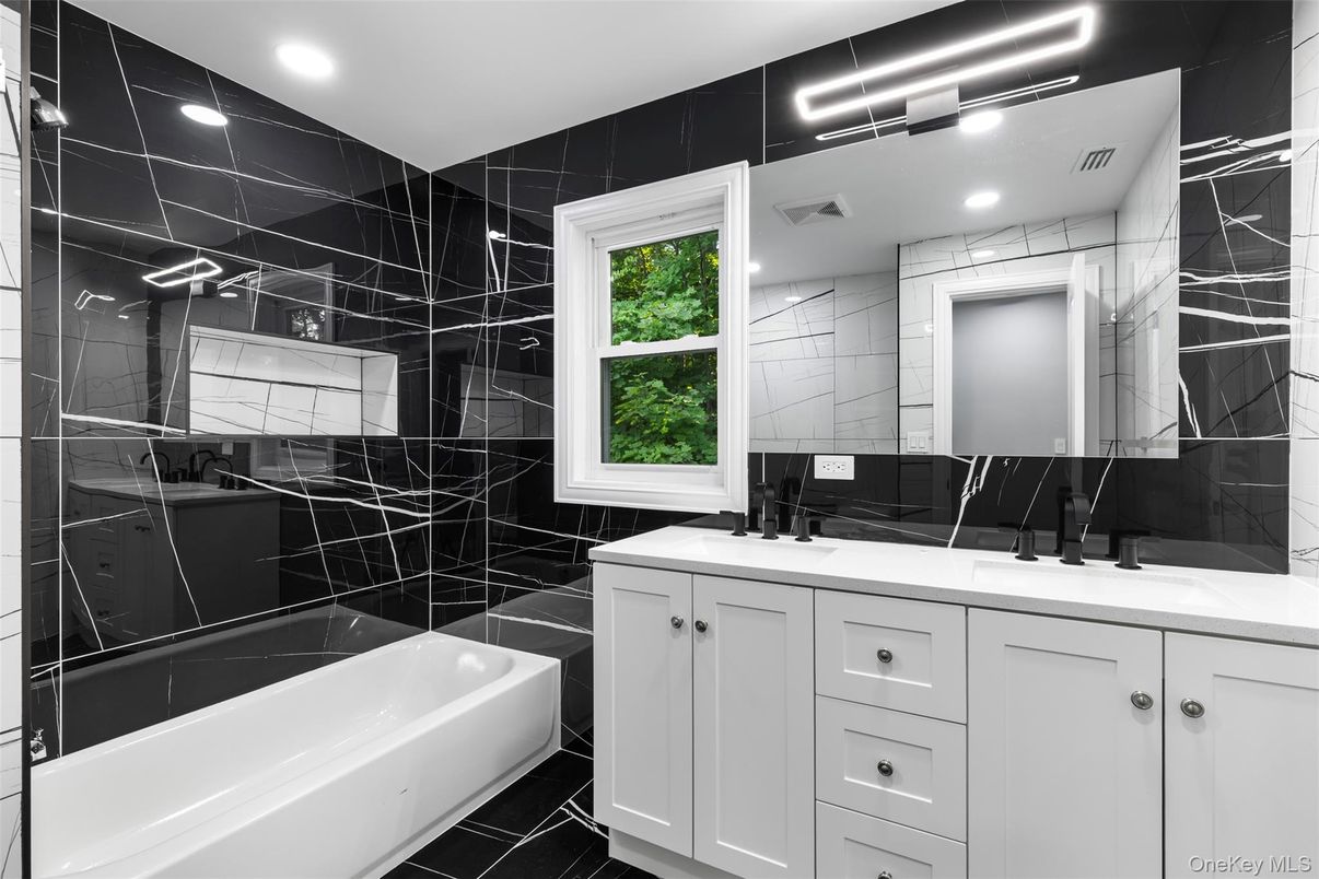 Bathroom, Dual Sink Vanities, Interior, Marble Walls, Recessed Lighting