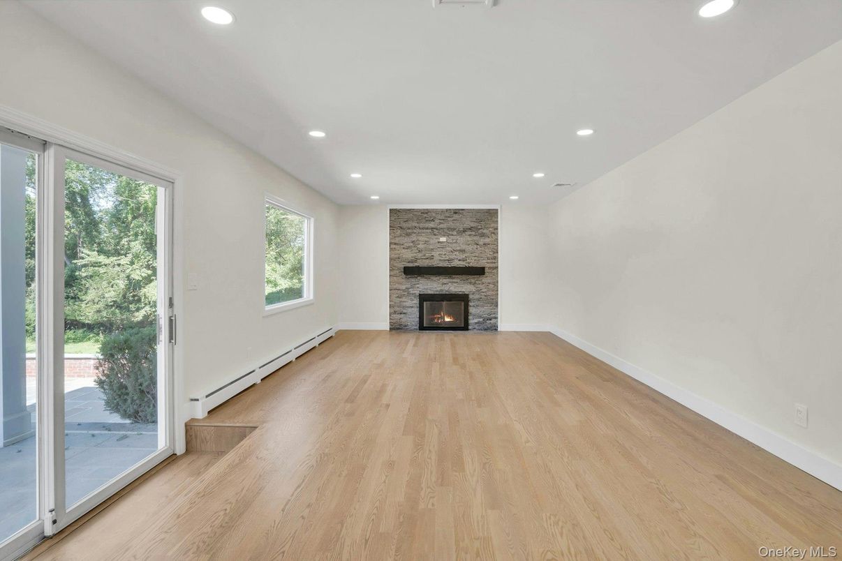 Empty room, Fireplace, Interior, Recessed Lighting, Wood Texture Flooring