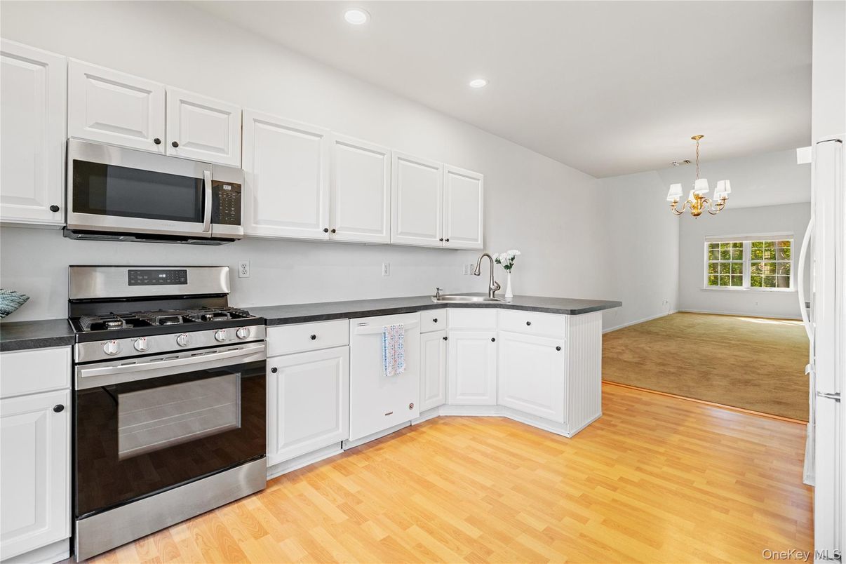 Chandelier, Interior, Kitchen, Recessed Lighting, Stainless Steel Appliances, Wood Texture Flooring