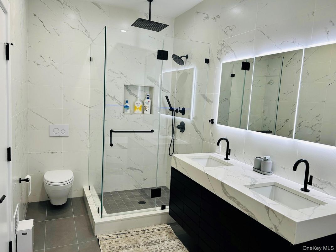 Bathroom, Dual Sink Vanities, Glass Shower, Interior, Marble Walls