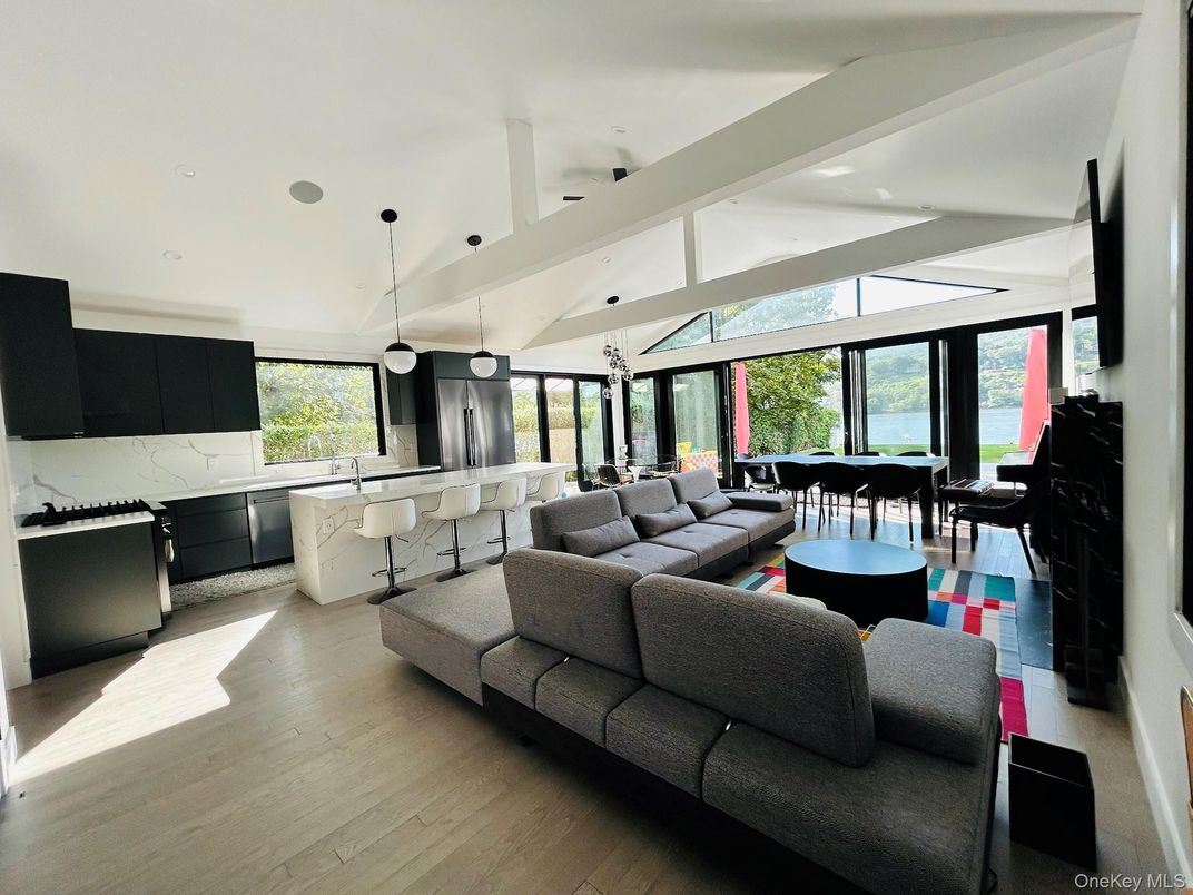 Dining room, Interior, Kitchen, Living room, Marble Walls, Pendant Lights, Recessed Lighting, Wood Texture Flooring