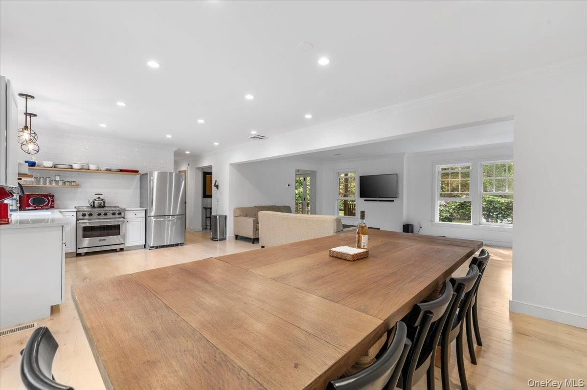Dining room, Interior, Kitchen, Pendant Lights, Recessed Lighting, Stainless Steel Appliances, Wood Texture Flooring