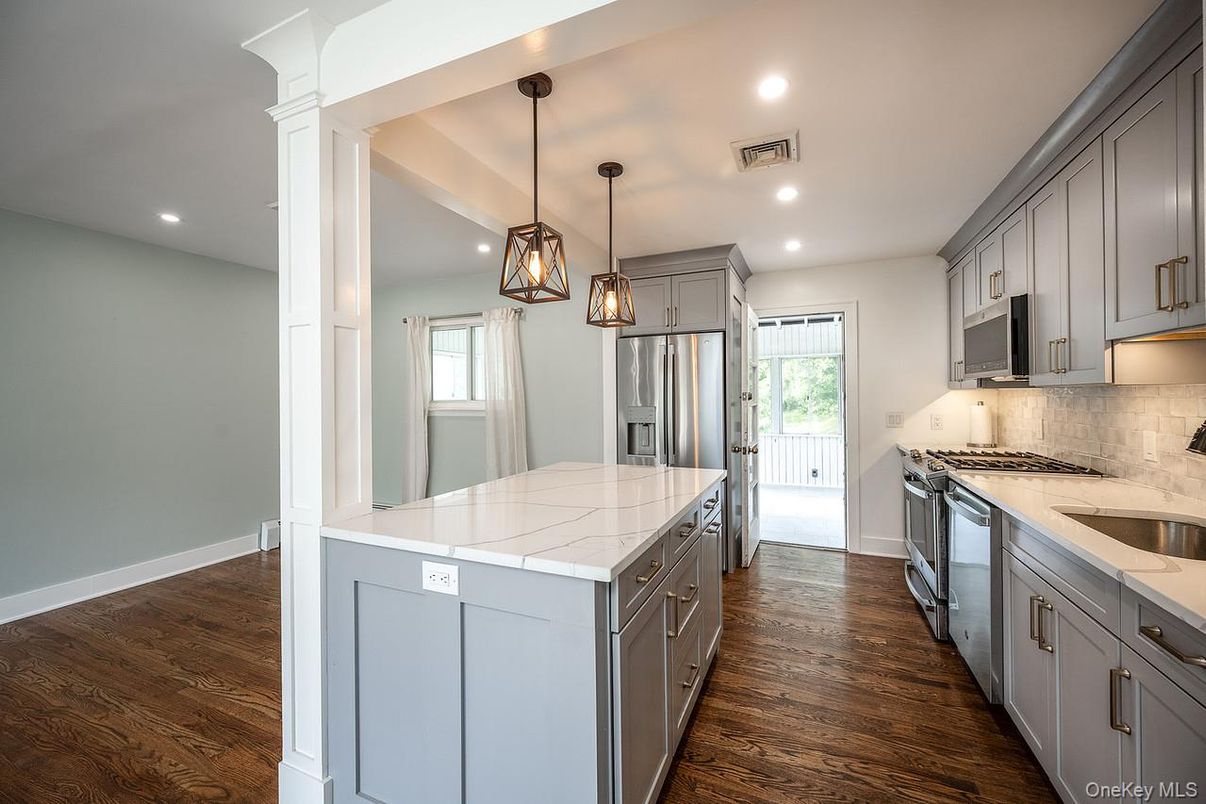 Interior, Kitchen, Pendant Lights, Recessed Lighting, Stainless Steel Appliances, Wood Texture Flooring