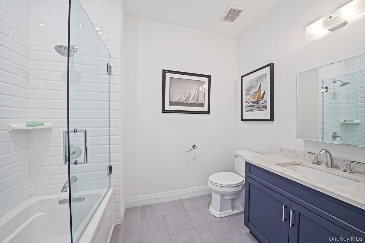 Bathroom, Dual Sink Vanities, Glass Shower, Interior, Wood Texture Flooring