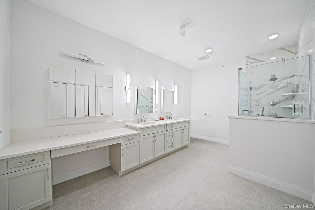 Bathroom, Dual Sink Vanities, Interior, Marble Walls, Recessed Lighting