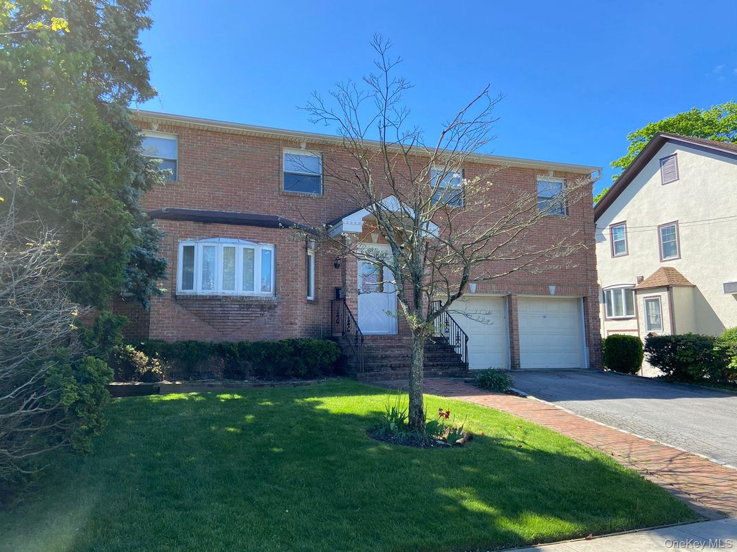 Attached, Exterior, Facade, Brick Facade, Tudor Revival
