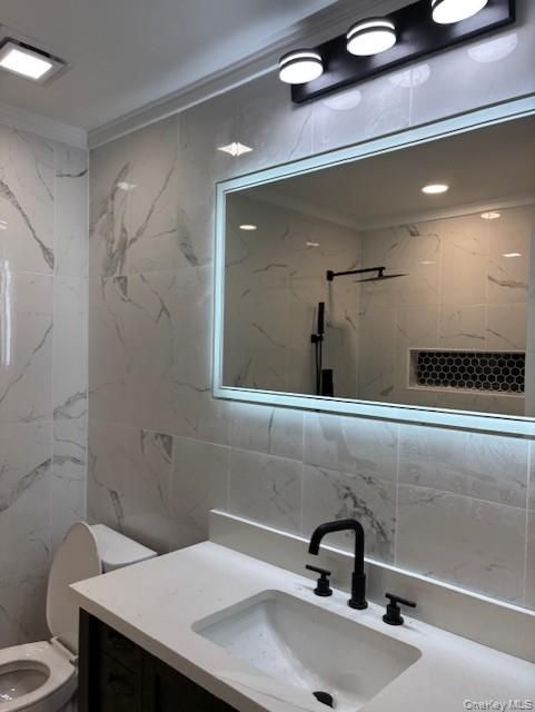 Bathroom, Dual Sink Vanities, Interior, Marble Walls, Recessed Lighting