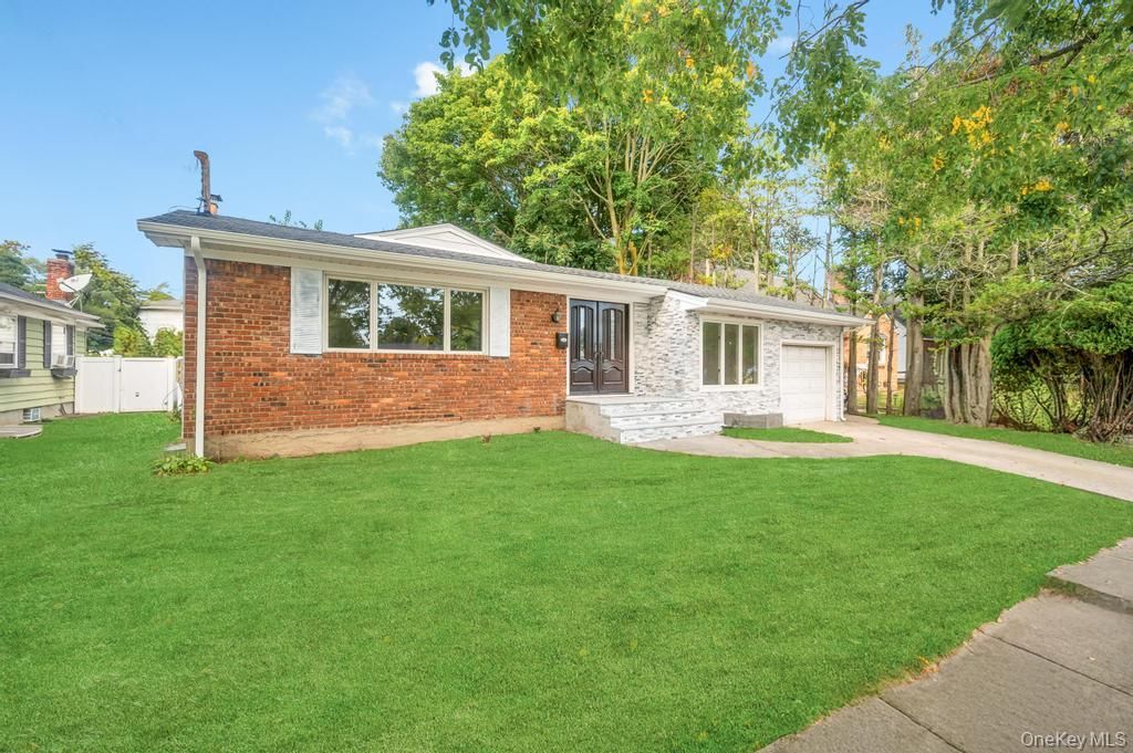 Attached, Backyard, Exterior, Facade, Brick Facade, Ranch