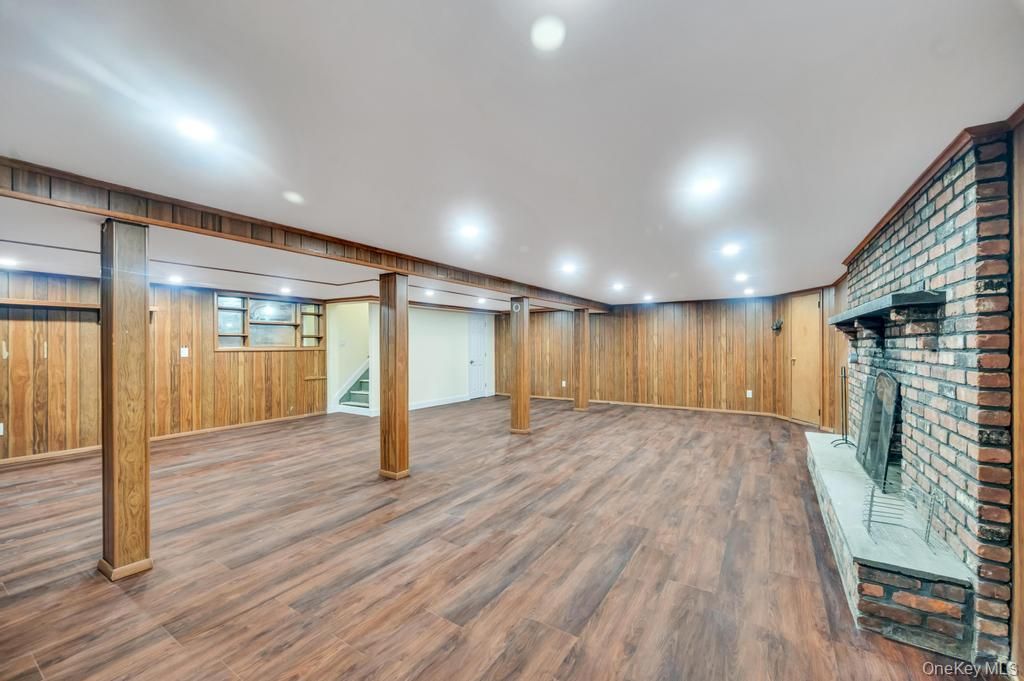 Empty room, Fireplace, Interior, Recessed Lighting, Wood Texture Flooring
