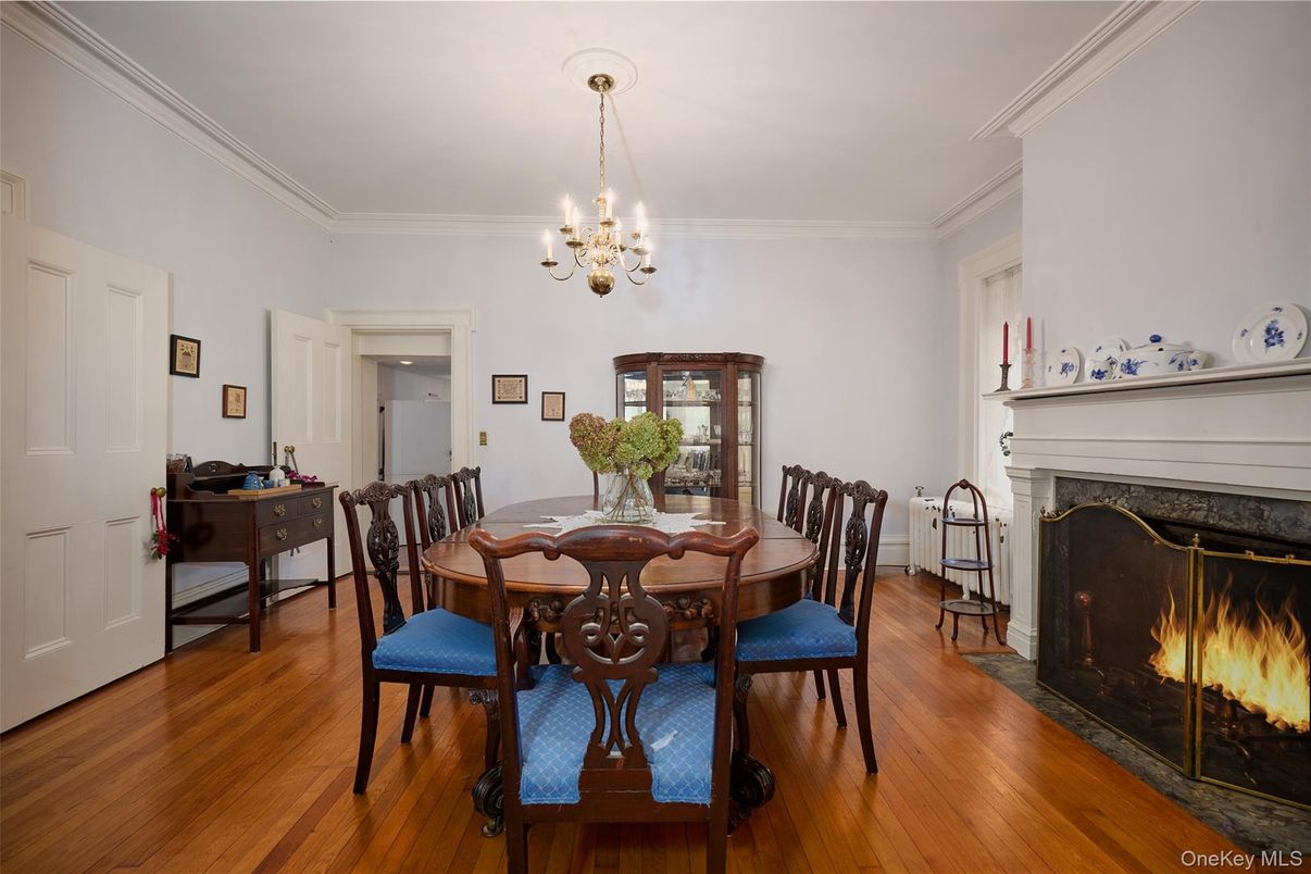 Chandelier, Dining room, Fireplace, Interior, Wood Texture Flooring