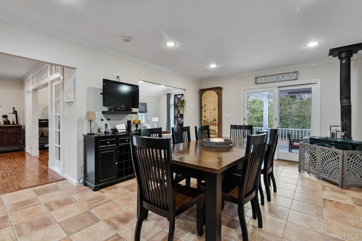 Dining room, Fireplace, Interior, Living room, Recessed Lighting, Wood Texture Flooring